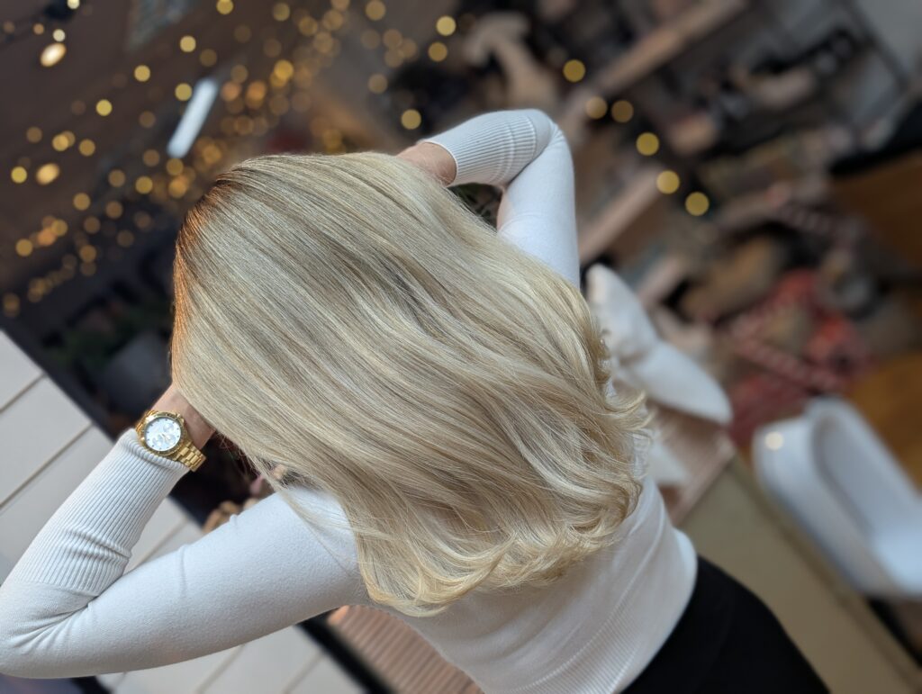 Beyond the Foil: Why AirTouch Balayage is the Ultimate Game-Changer for Paisley Blondes 3 Creamy blonde balayage and long hair styling by expert hairdresser in Paisley