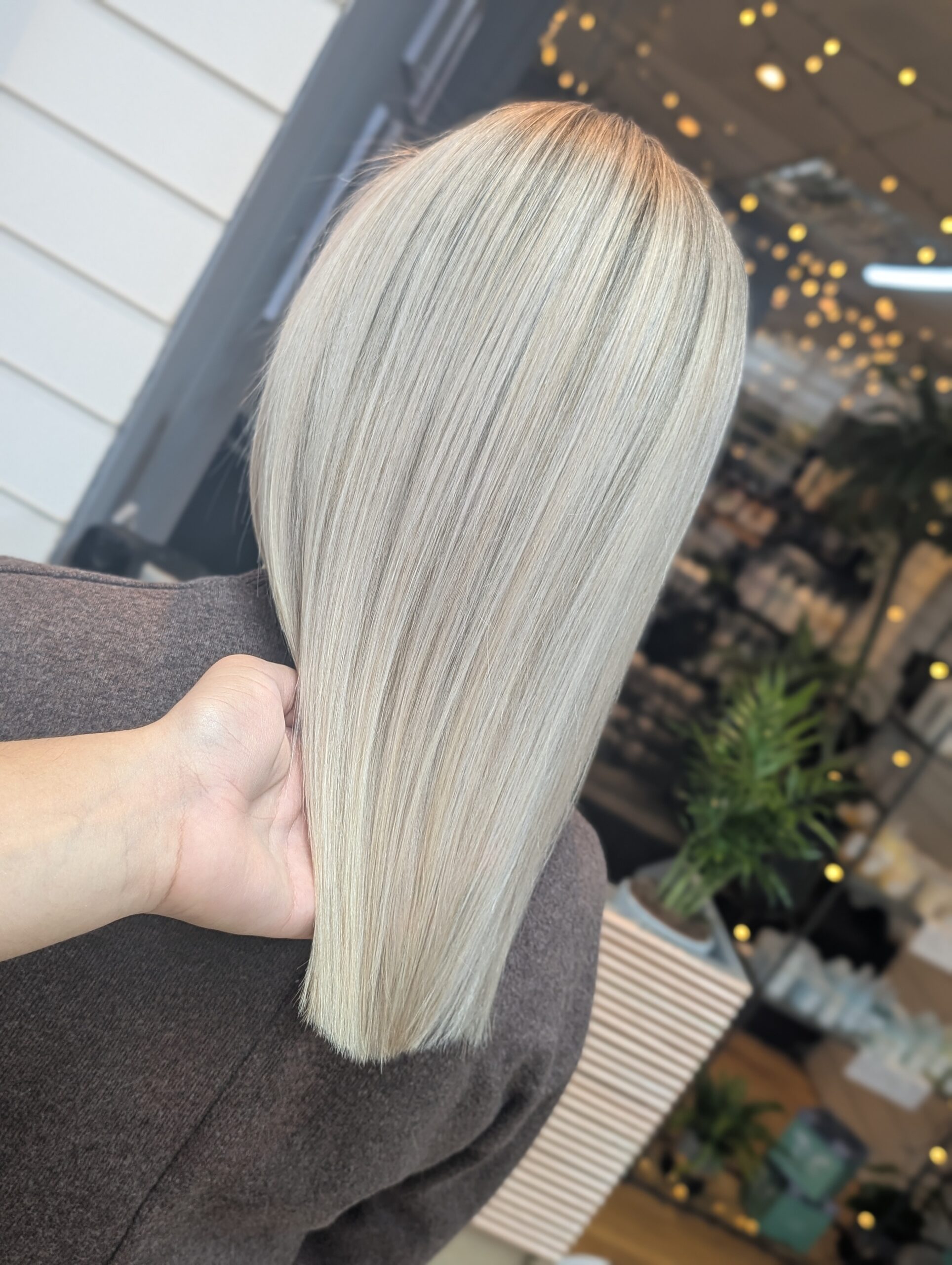 Creative blonde balayage and styling by Paisley hairdressers